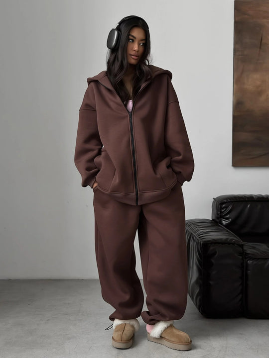 Damen Oversize-Kapuzenjacke mit verdecktem Reißverschluss und komfortabler Scuba-Optik Shop Nory
