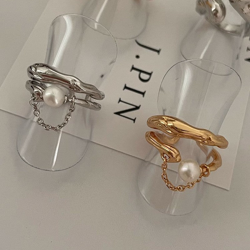 Damen Offener Ring mit künstlerischem Wellen-Design und elegantem Perlenanhänger Shop Nory