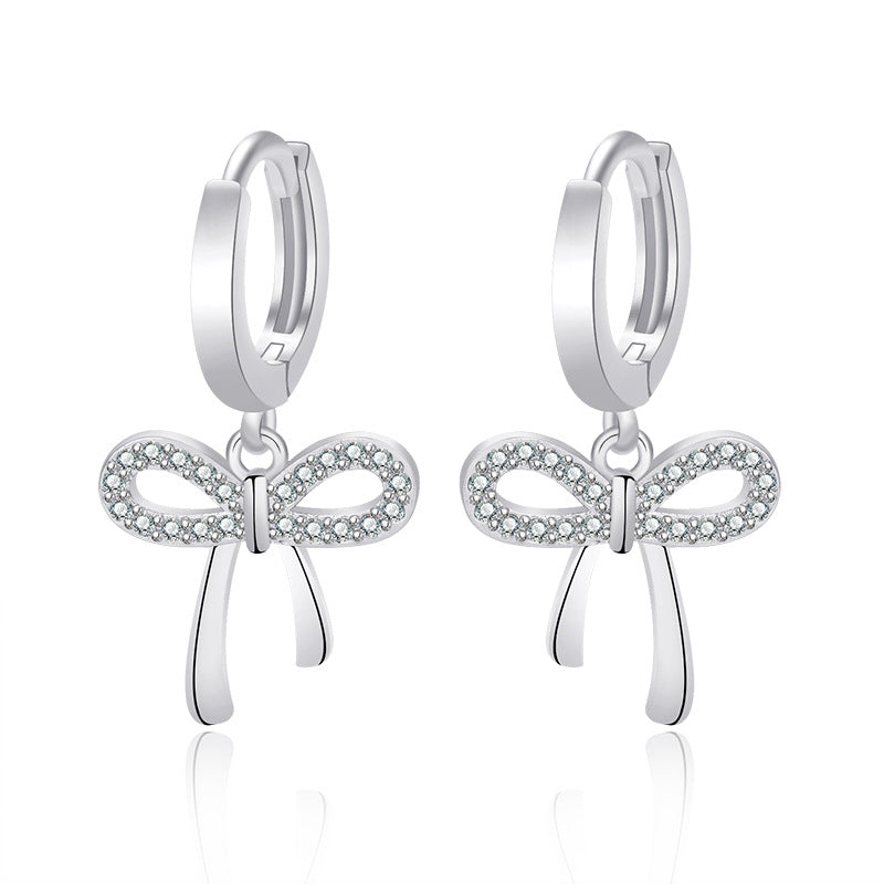Damen Ohrstecker mit funkelndem Schleifen-Design und eleganten Zirkonia-Details Shop Nory