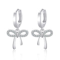 Damen Ohrstecker mit funkelndem Schleifen-Design und eleganten Zirkonia-Details Shop Nory
