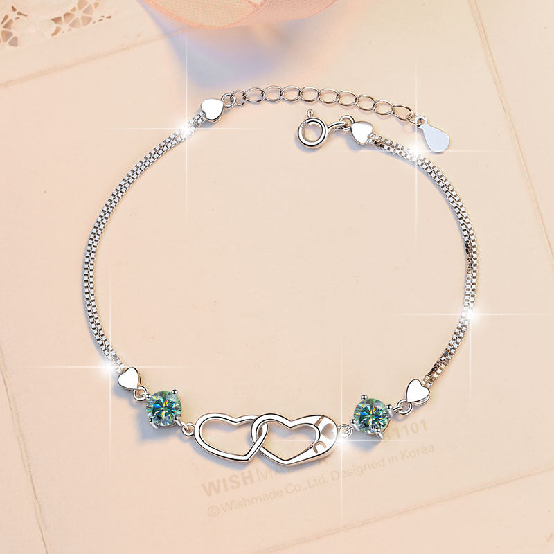 Damenarmband mit elegantem Herzdesign und funkelnden Zirkonia Shop Nory