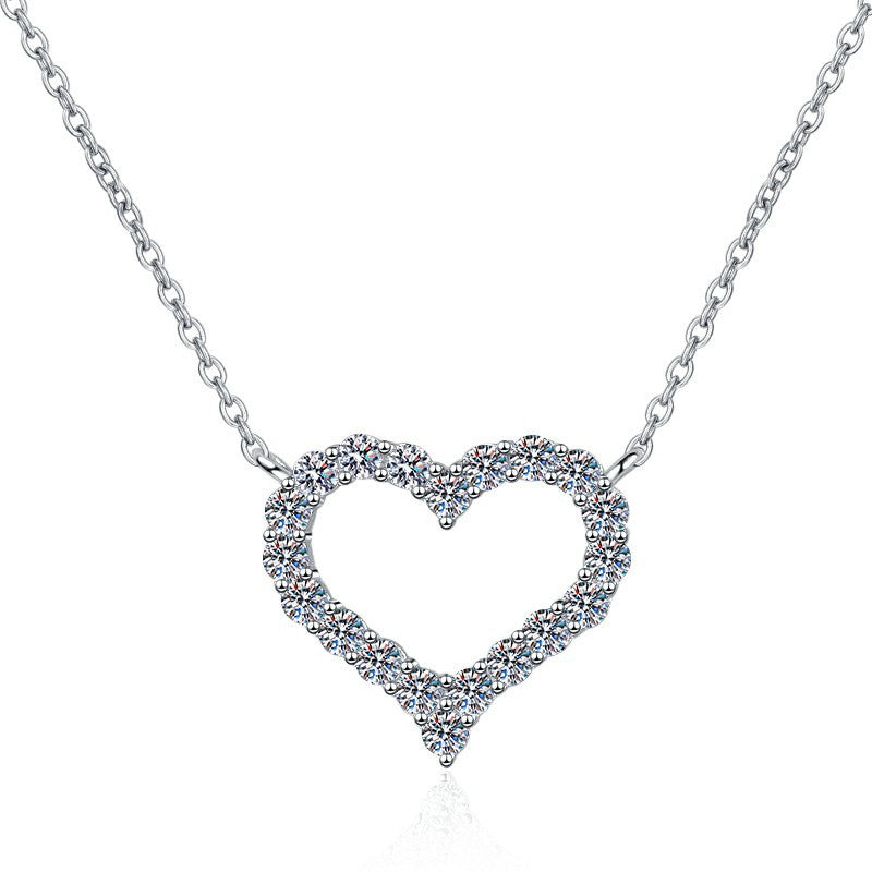 Damen Halskette mit einem liebevollen Herzanhänger und funkelnden Kristallen Shop Nory