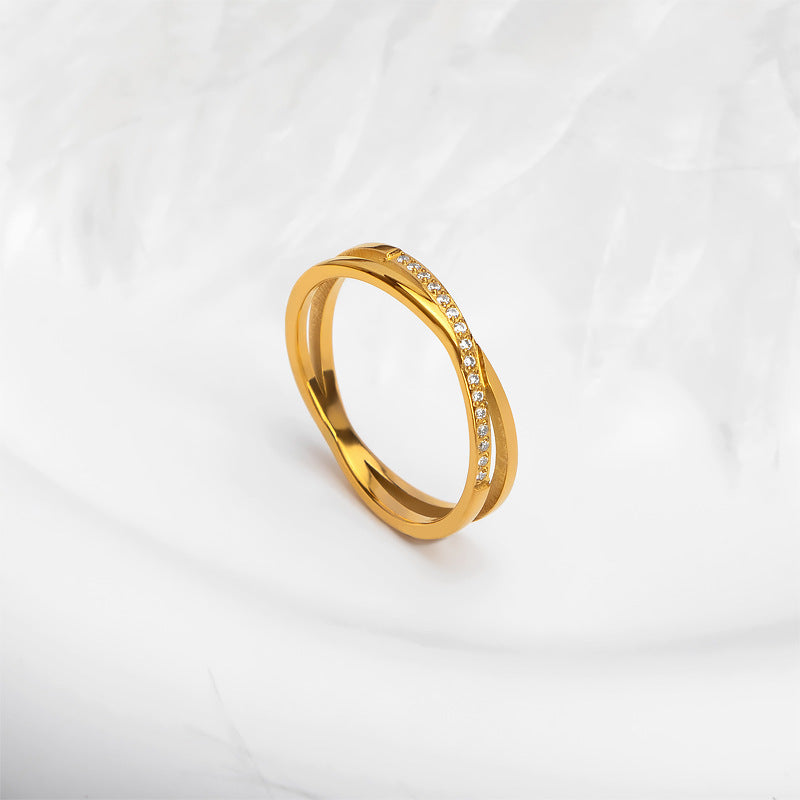 Damen eleganter Ring mit geflochtenem Design und funkelnden Zirkonia-Steinen Shop Nory