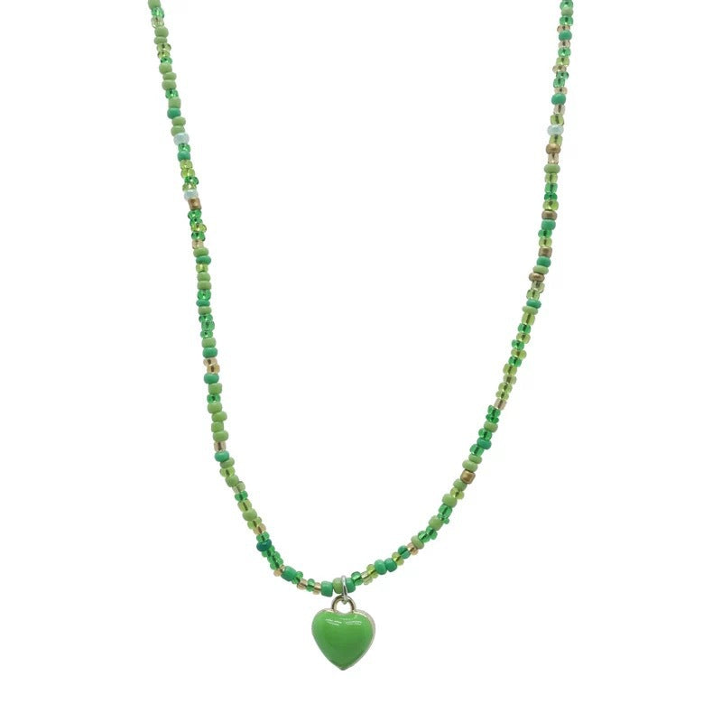 Damen Halskette mit bunten Perlen und herzförmigem Anhänger Shop Nory