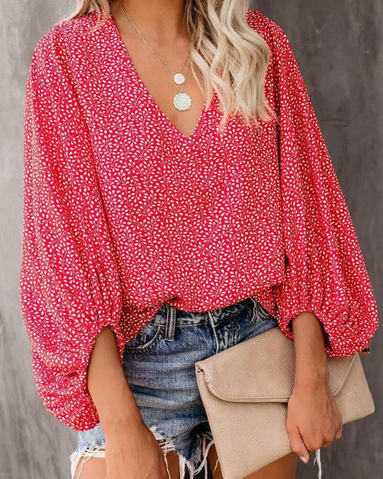 Damen Bluse mit weiten Ärmeln und floralem Muster