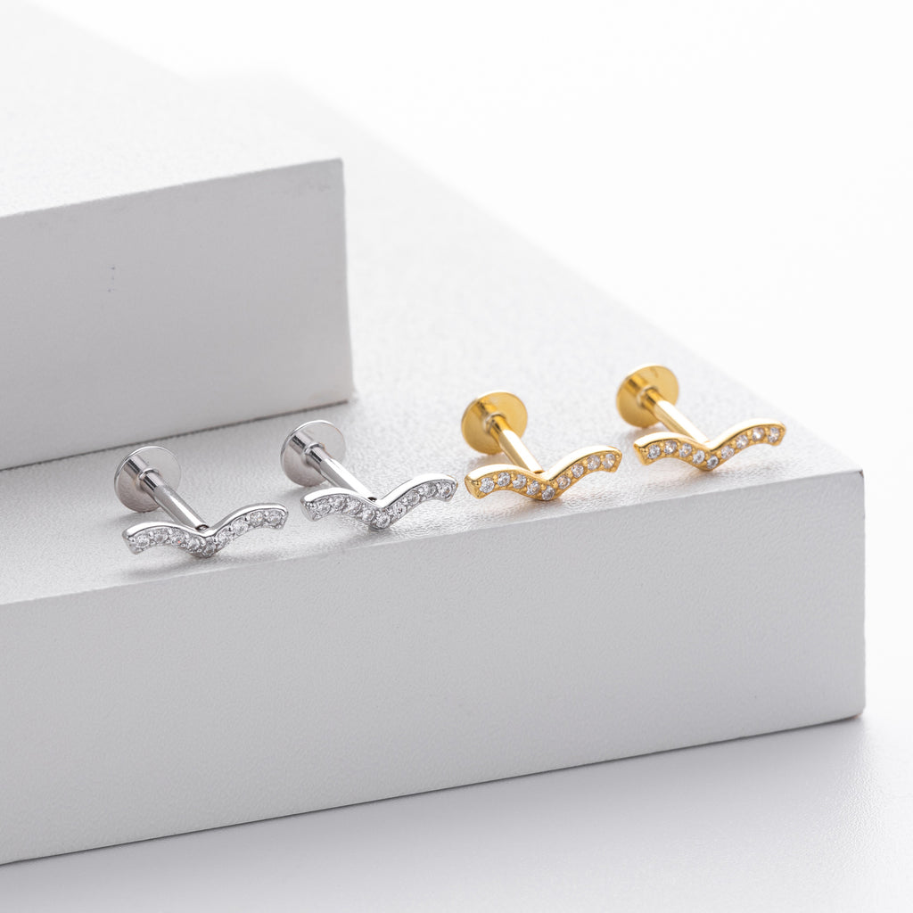 Damen Ohrstecker in modernem Schwungdesign mit funkelnden Zirkonia aus hochwertigem 925 Sterlingsilber Shop Nory