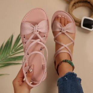 Damen Zarte Römersandalen mit Schleifen-Detail und verstellbaren Schnürriemen Shop Nory