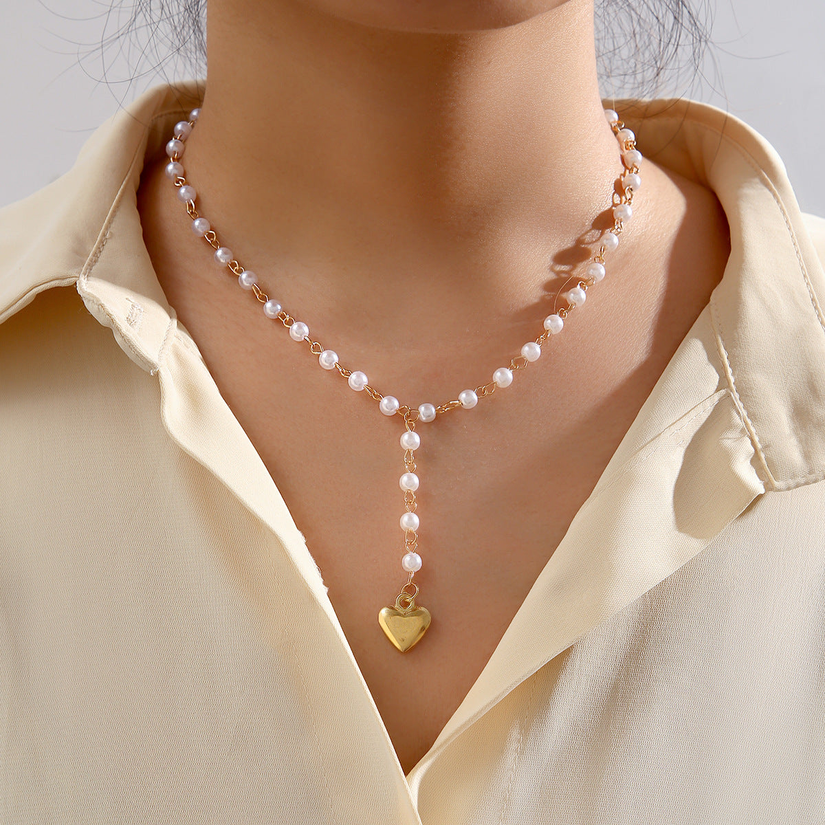 Damen Perlenschmuck mit herzförmigem Anhänger Shop Nory