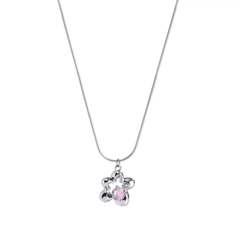 Damen Halskette mit floralem Anhänger und funkelndem Kristall Shop Nory