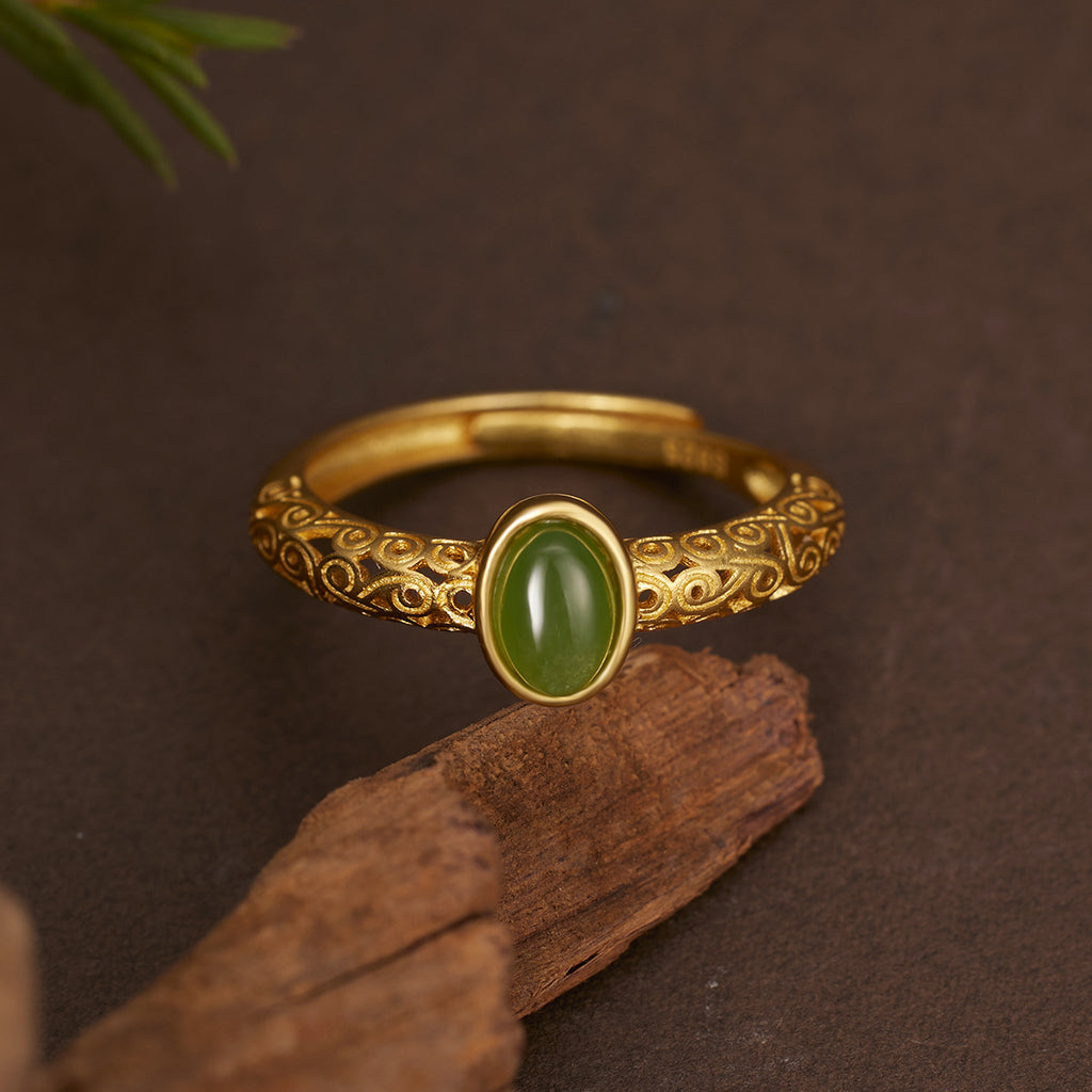 Damen eleganter Ring mit kunstvollem Design und grünem Halbedelstein Shop Nory