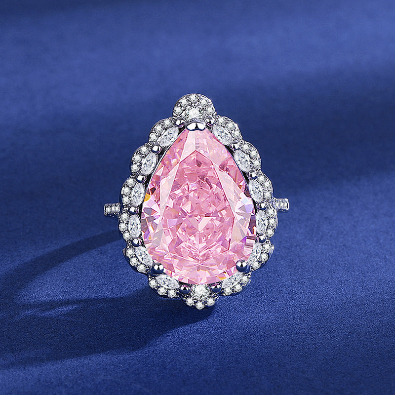 Damen eleganter und funkelnder Ring mit tropfenförmigem pinkem Stein Shop Nory