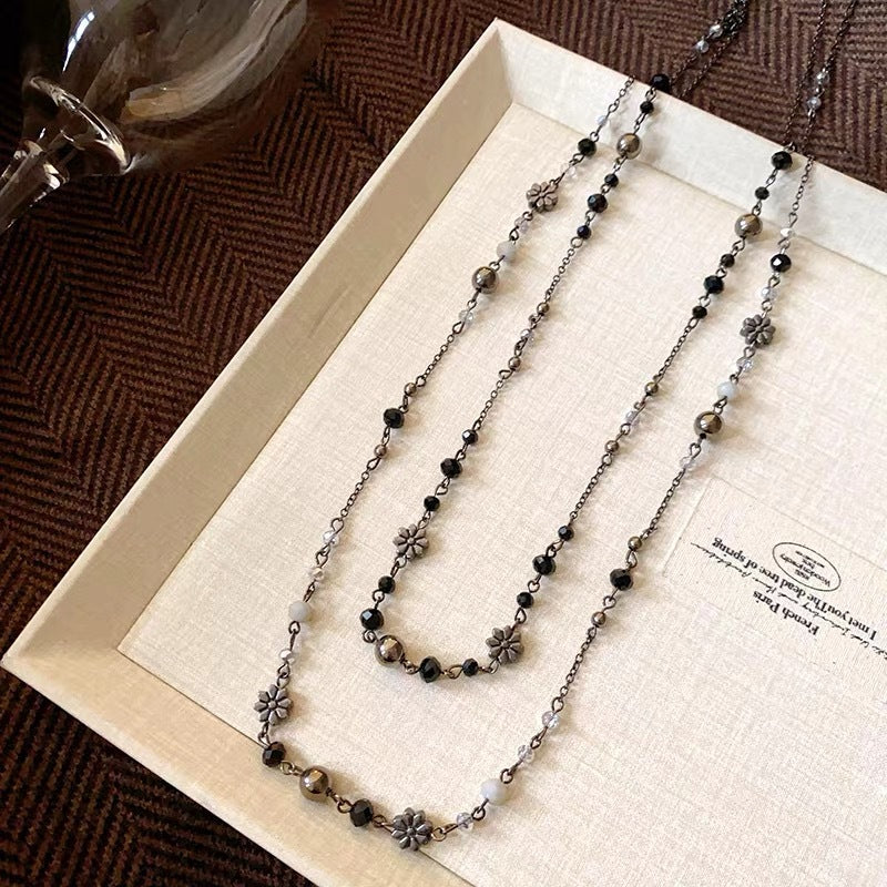Damen mehrlagige Halskette mit floralem Design und funkelnden Akzenten Shop Nory