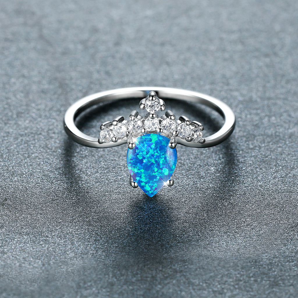 Damen Ring mit tropfenförmigem Opal und funkelnden Zirkonia-Elementen Shop Nory