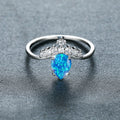 Damen Ring mit tropfenförmigem Opal und funkelnden Zirkonia-Elementen Shop Nory