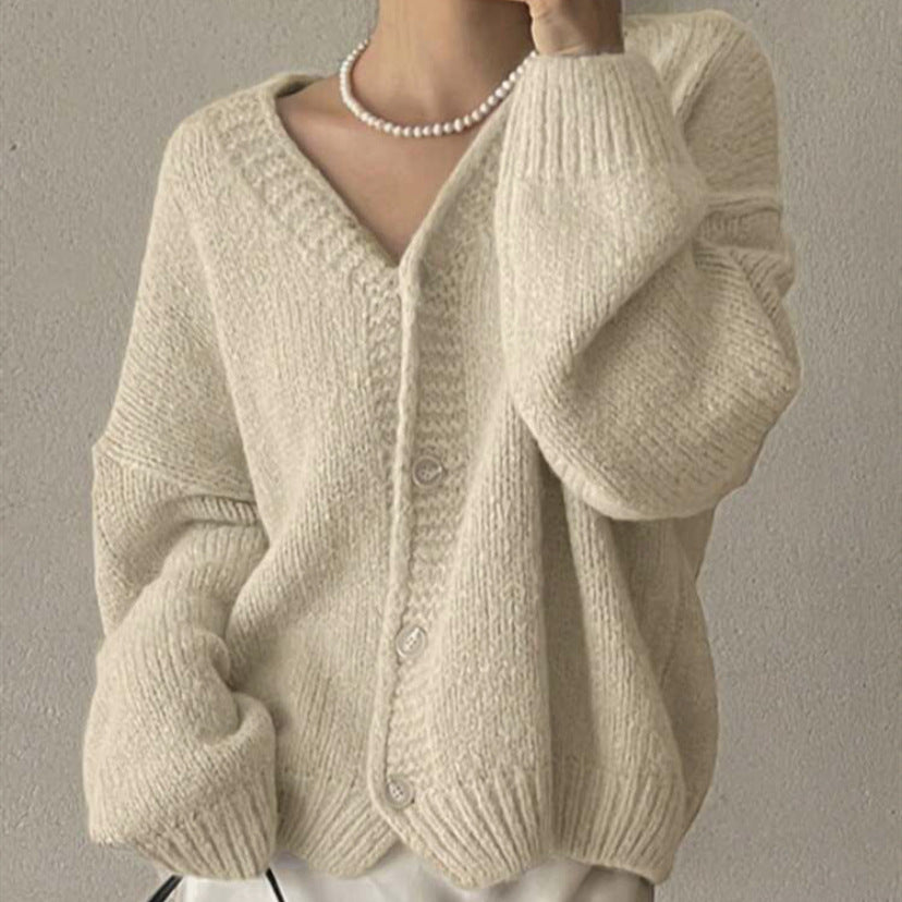 Damen Oversize-Strickjacke mit tiefem V-Ausschnitt, Ballonärmeln und Zierknopfleiste Shop Nory