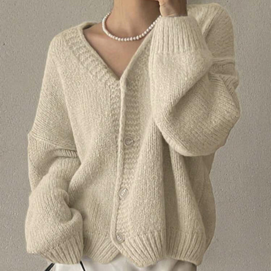 Damen Oversize-Strickjacke mit tiefem V-Ausschnitt, Ballonärmeln und Zierknopfleiste Shop Nory