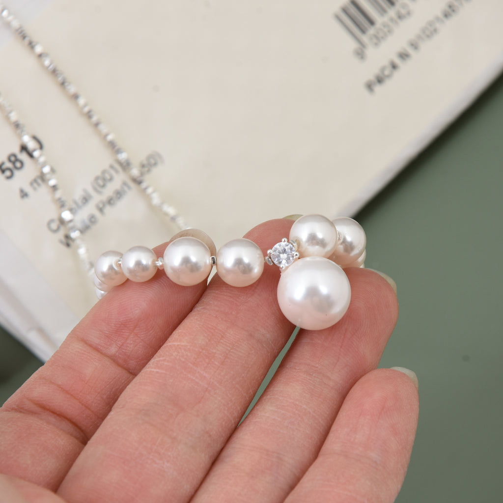 Damen Halskette mit schimmernden Perlen und funkelnden Details Shop Nory