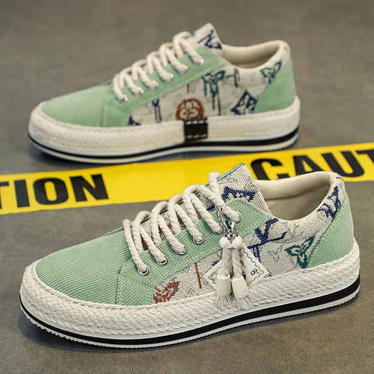 Damen bestickte Canvas‑Sneaker mit Quastenanhänger und geflochtener Plateausohle Shop Nory