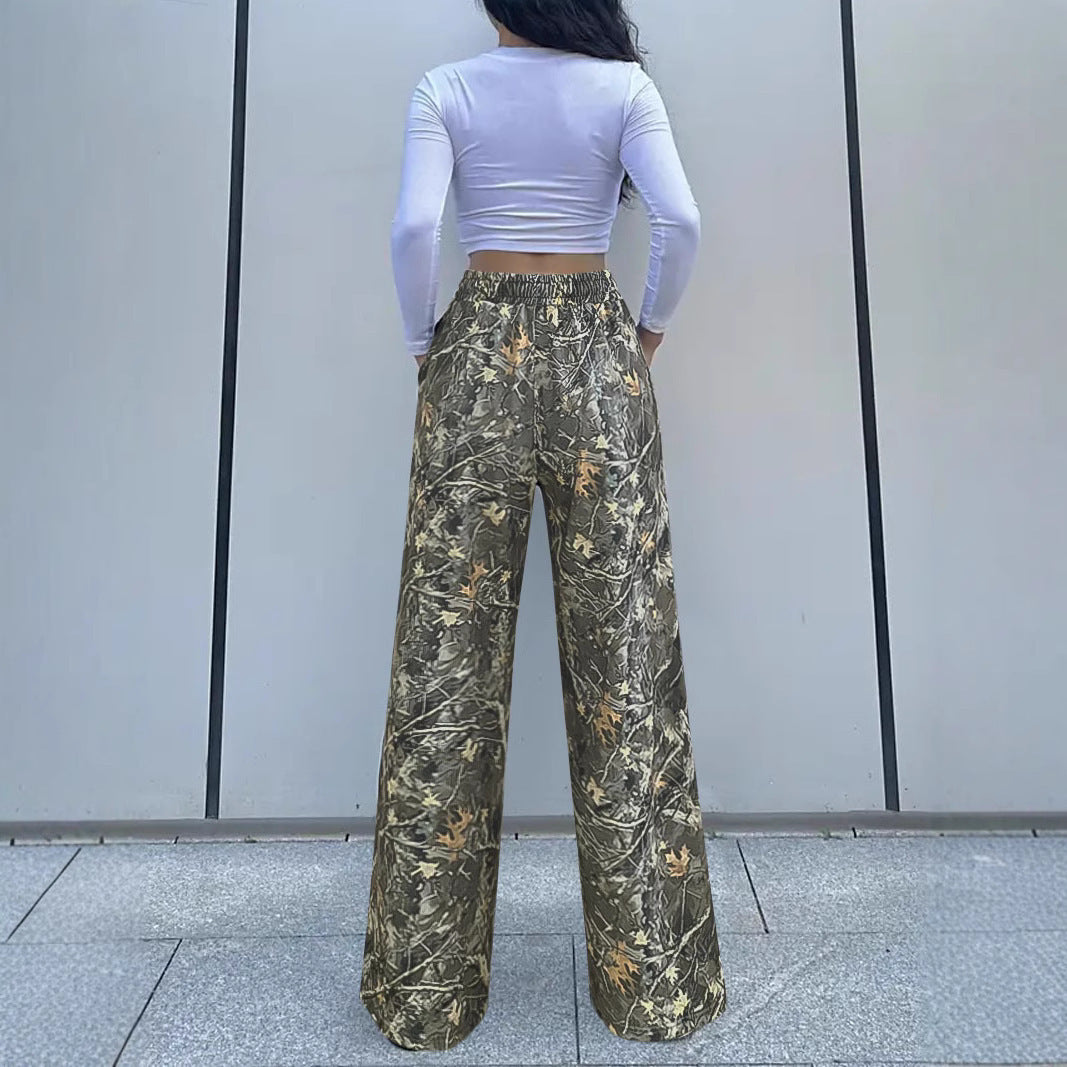 Damen Weite Palazzo-Loungehose im Camouflage-Blattmuster mit Elastikbund, Tunnelzug und Eingrifftaschen Shop Nory