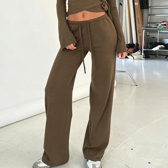 Damen nan Wickel-Cropped-Top mit tiefem V‑Ausschnitt, taillierter Wickelform und langen Glockenärmeln Shop Nory