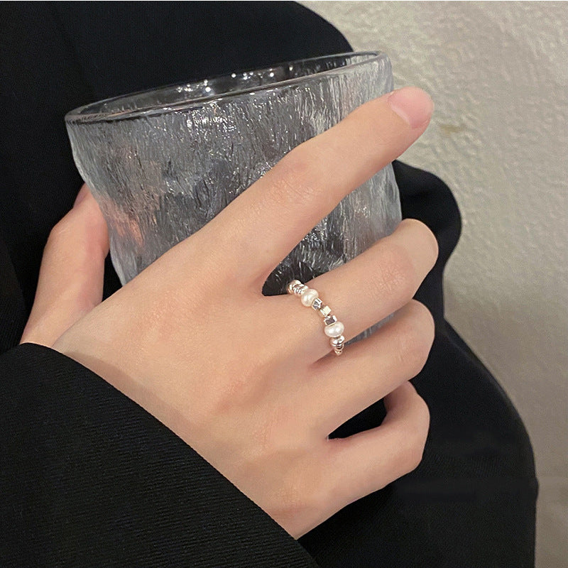 Damen Ring mit kunstvollem Design und edlen Perlenakzenten Shop Nory