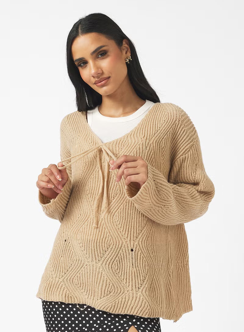 Damen Oversize Strickpullover mit V-Ausschnitt, Kordelzug und Rautenstruktur Shop Nory