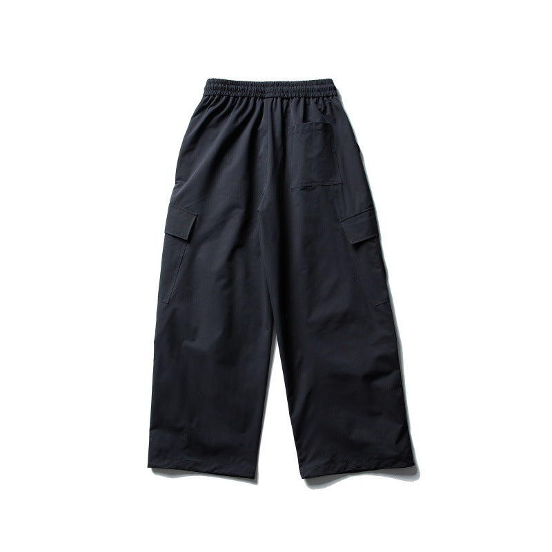 Unisex Weite Cargo-Utility-Hose im Baggy-Schnitt mit elastischem Kordelbund und großzügigen Klappentaschen Shop Nory
