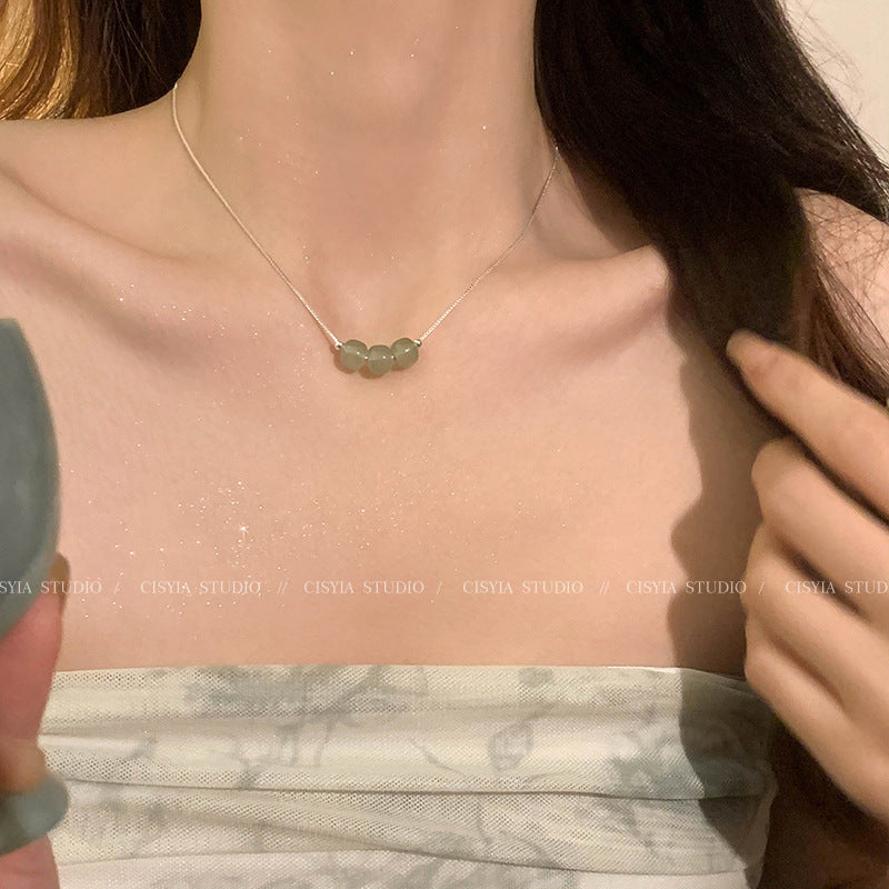 Damen Halskette mit hochwertigem Jade-Anhänger und Edelstahl-Elementen Shop Nory