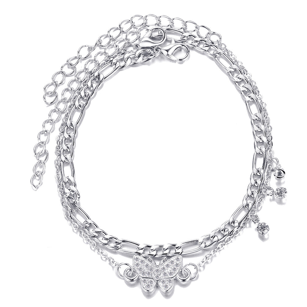 Damen Fußkettchen mit funkelnden Ornamenten und floralen Details Shop Nory