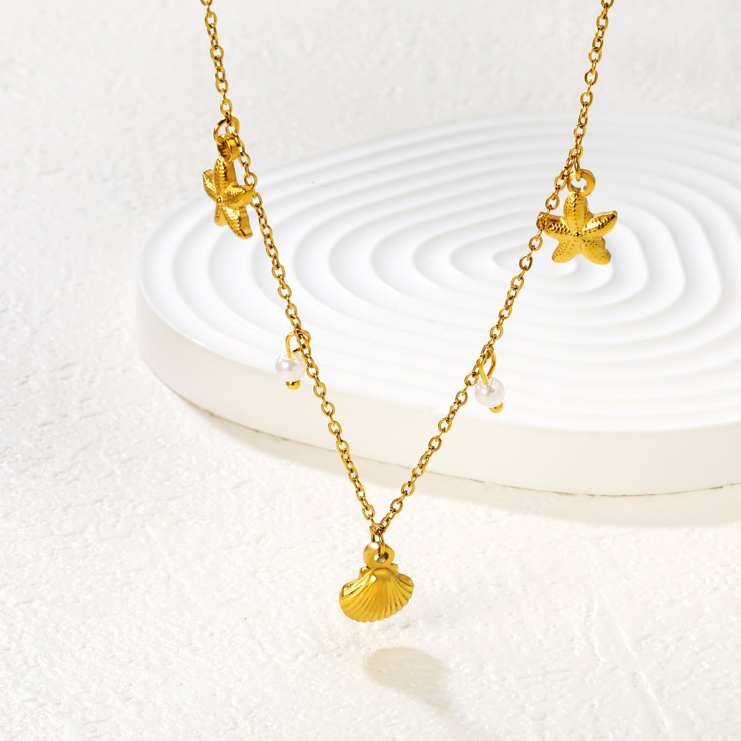 Damen Halskette mit maritimen Muscheln und Sternenanhängern Shop Nory