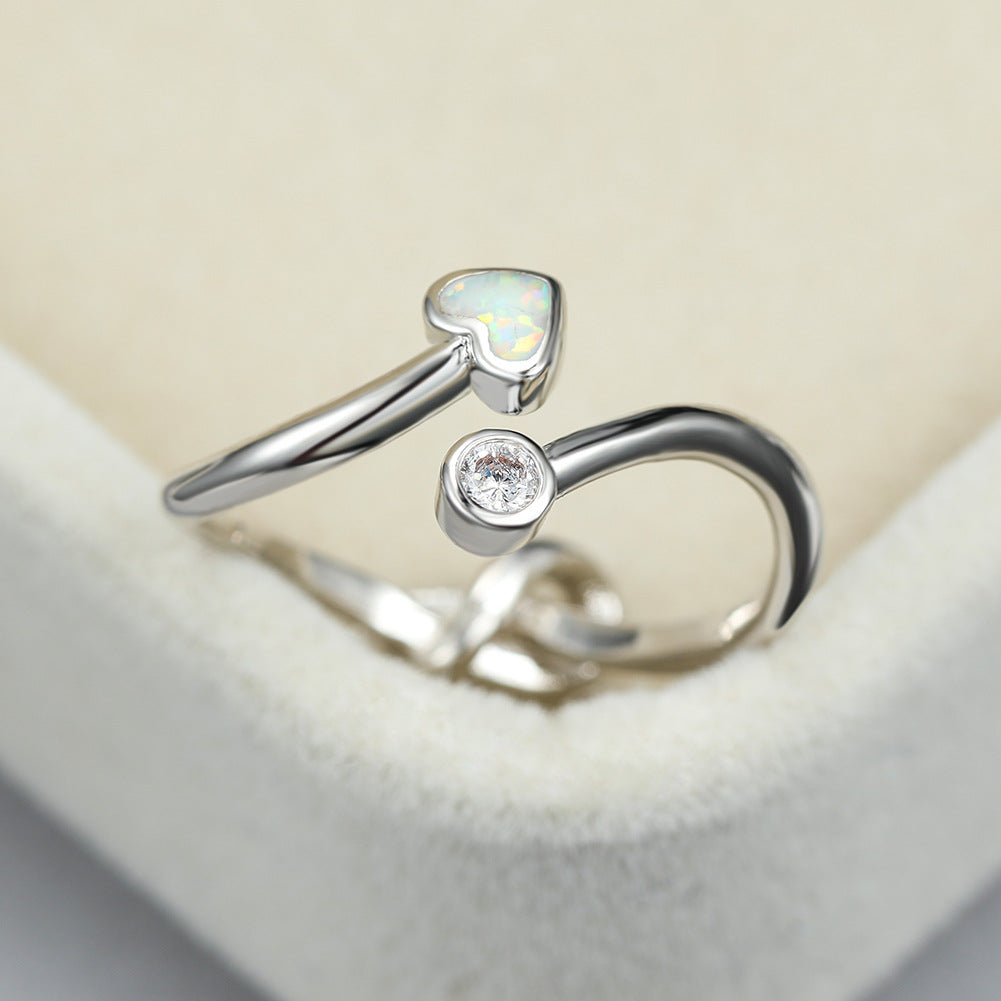 Damen Ring mit funkelndem Zirkonia und herzförmigem Opaleinsatz Shop Nory