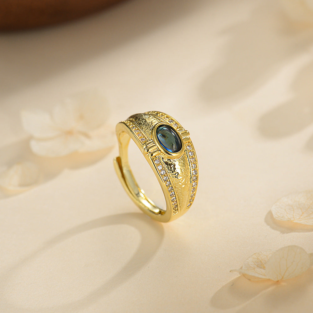 Damen Ring mit funkelndem Stein und kunstvollem goldenen Design Shop Nory