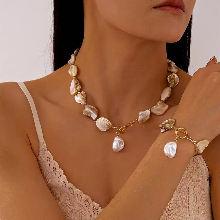 Damen Schmuckset aus einzigartigen Muschelhelen und edlem Goldverschluss Shop Nory
