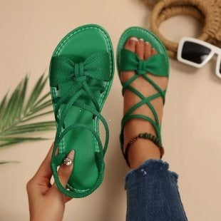 Damen Zarte Römersandalen mit Schleifen-Detail und verstellbaren Schnürriemen Shop Nory