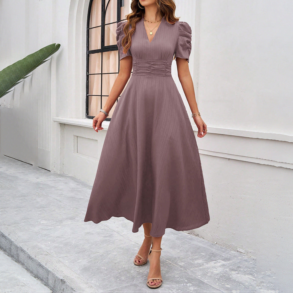 Damen Maxikleid mit elegant verarbeiteten Puffärmeln und taillierter Silhouette Shopnory