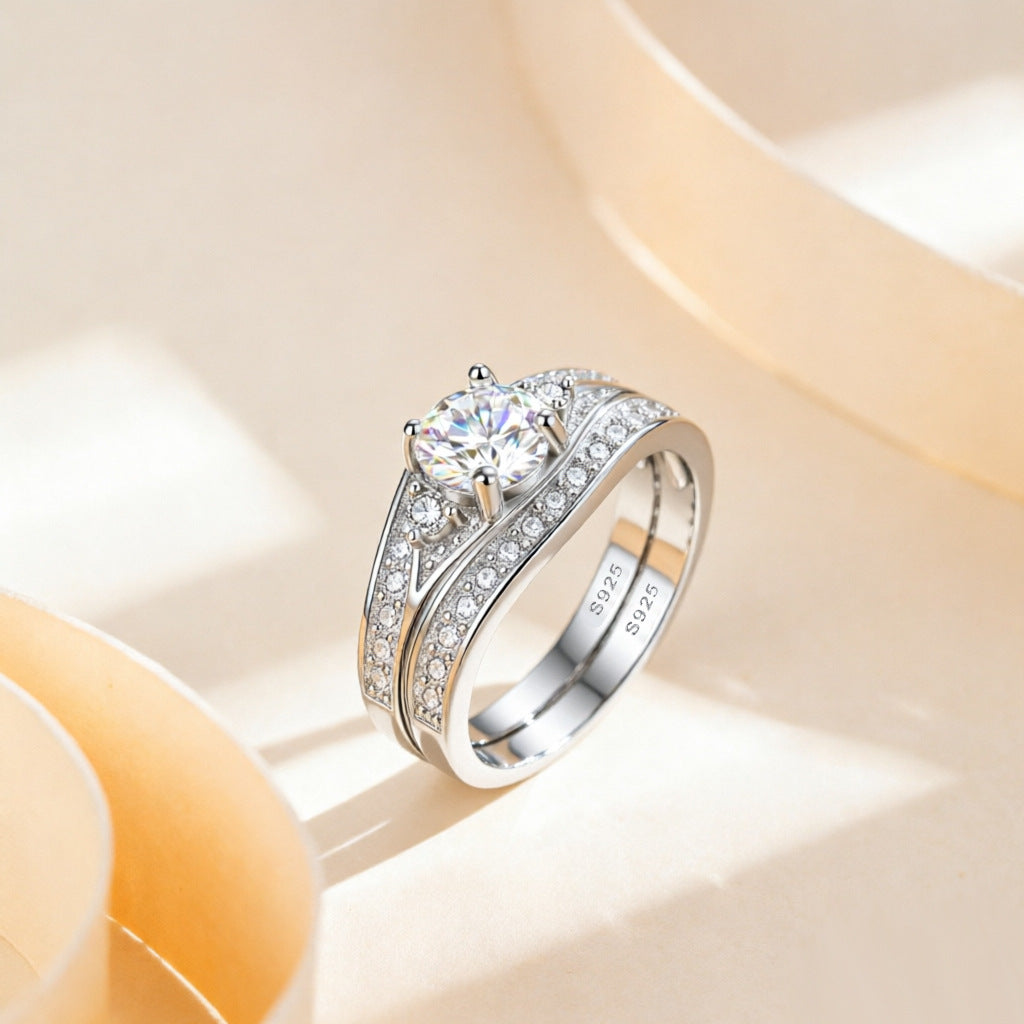 Damenring mit elegantem, geschwungenem Design und funkelndem Zirkonia-Besatz Shop Nory