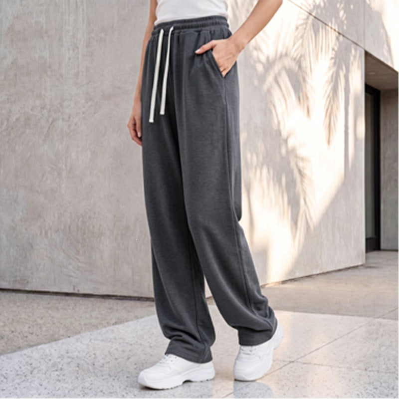 Damen nan weite Loungepalazzo-Hose mit hohem Komfortbund, Kordelzug, seitlichen Eingrifftaschen und dekorativer Seitennaht Shop Nory
