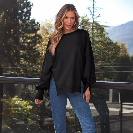 Damen Weiches Longline-Sweatshirt mit Ballonärmeln, seitlichen Schlitzen und geripptem Saum Shop Nory