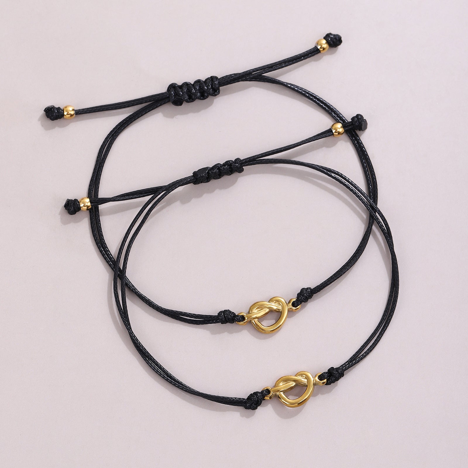 Damenarmband mit verstellbarem Knoten und Herzverschluss Shop Nory