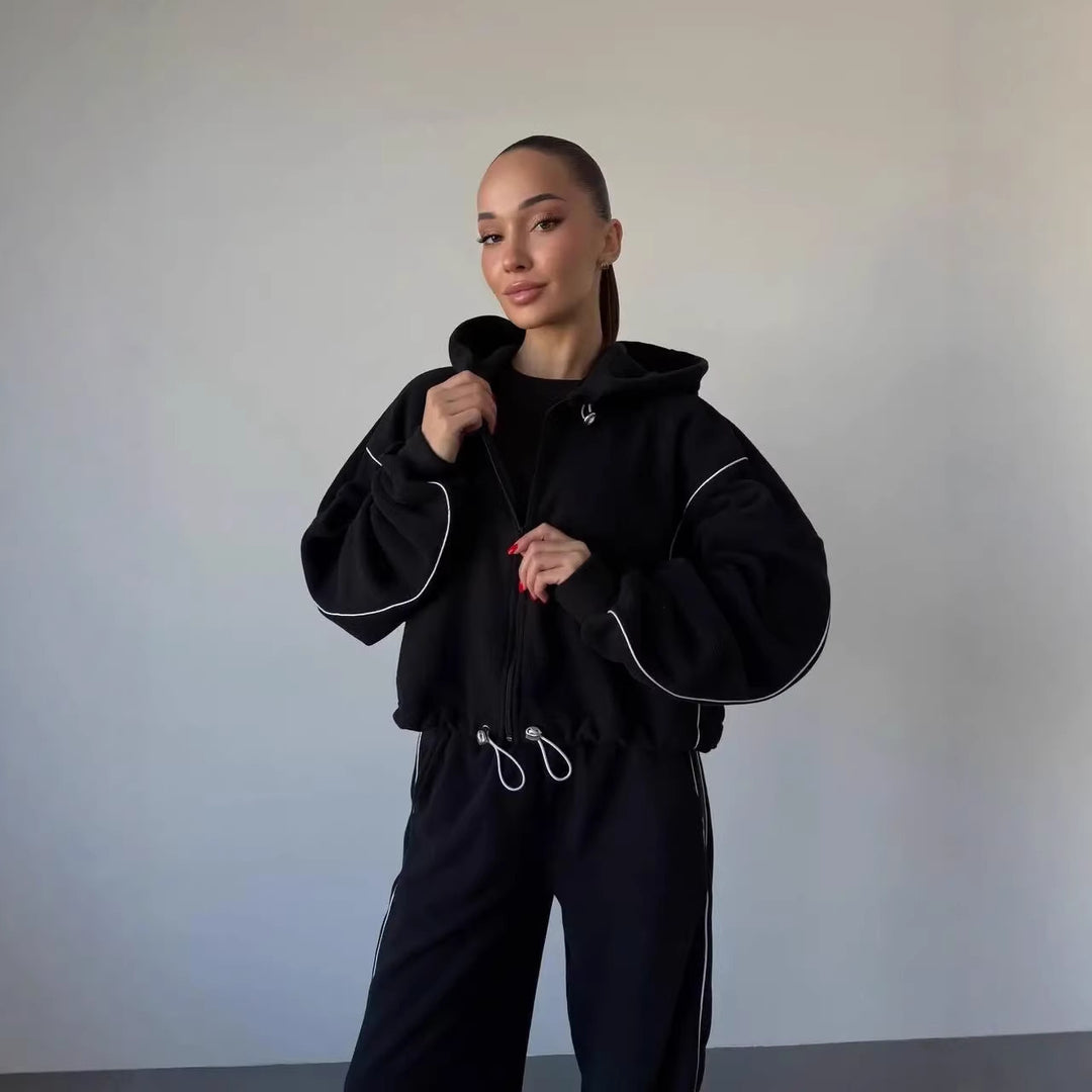 Damen gekürztes Zip-Hoodie mit Tunnelzug und hochgeschnittener weiter Fleece-Loungehose Shop Nory