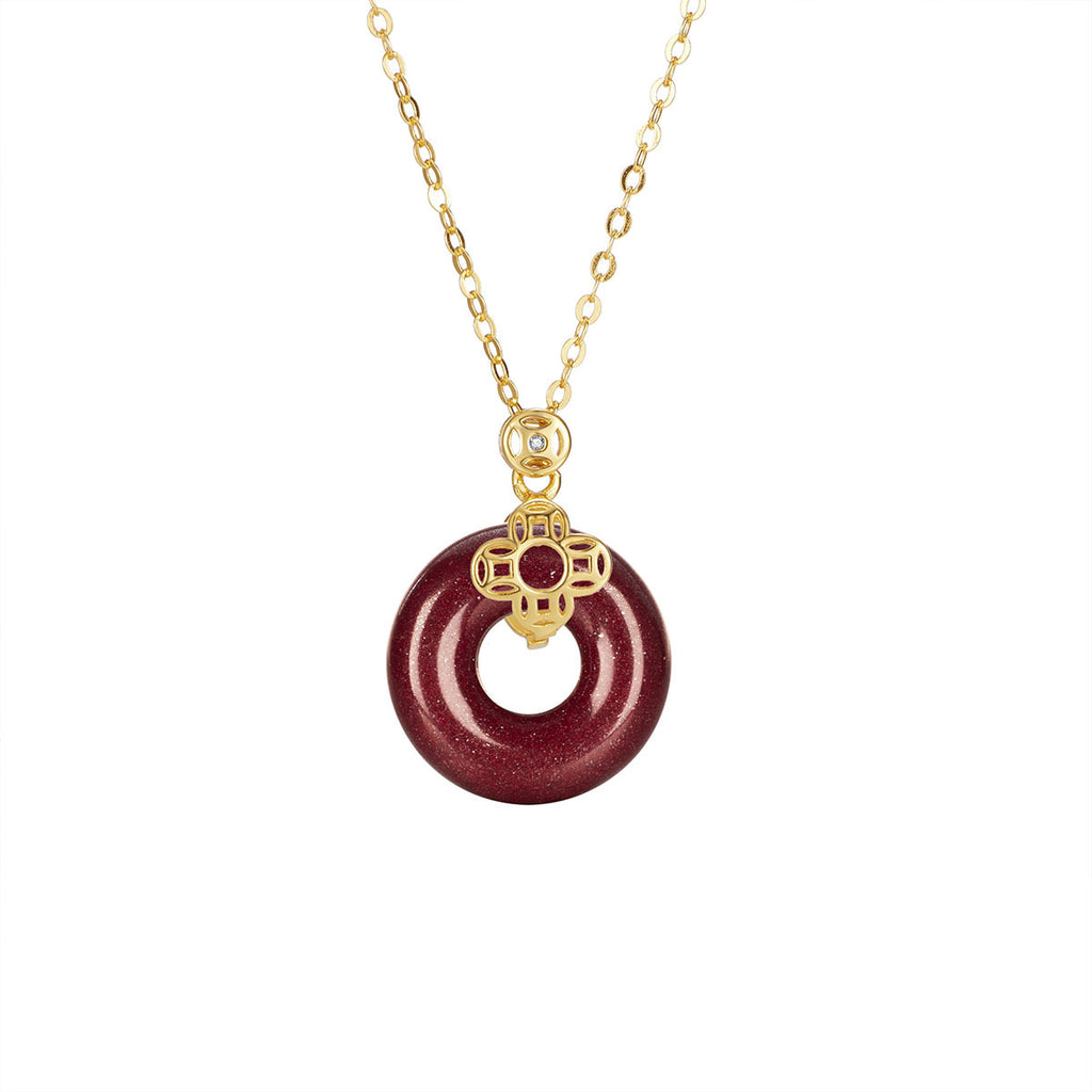 Damen Halskette mit kunstvollem Goldanhänger und elegantem Donut-Design Shop Nory