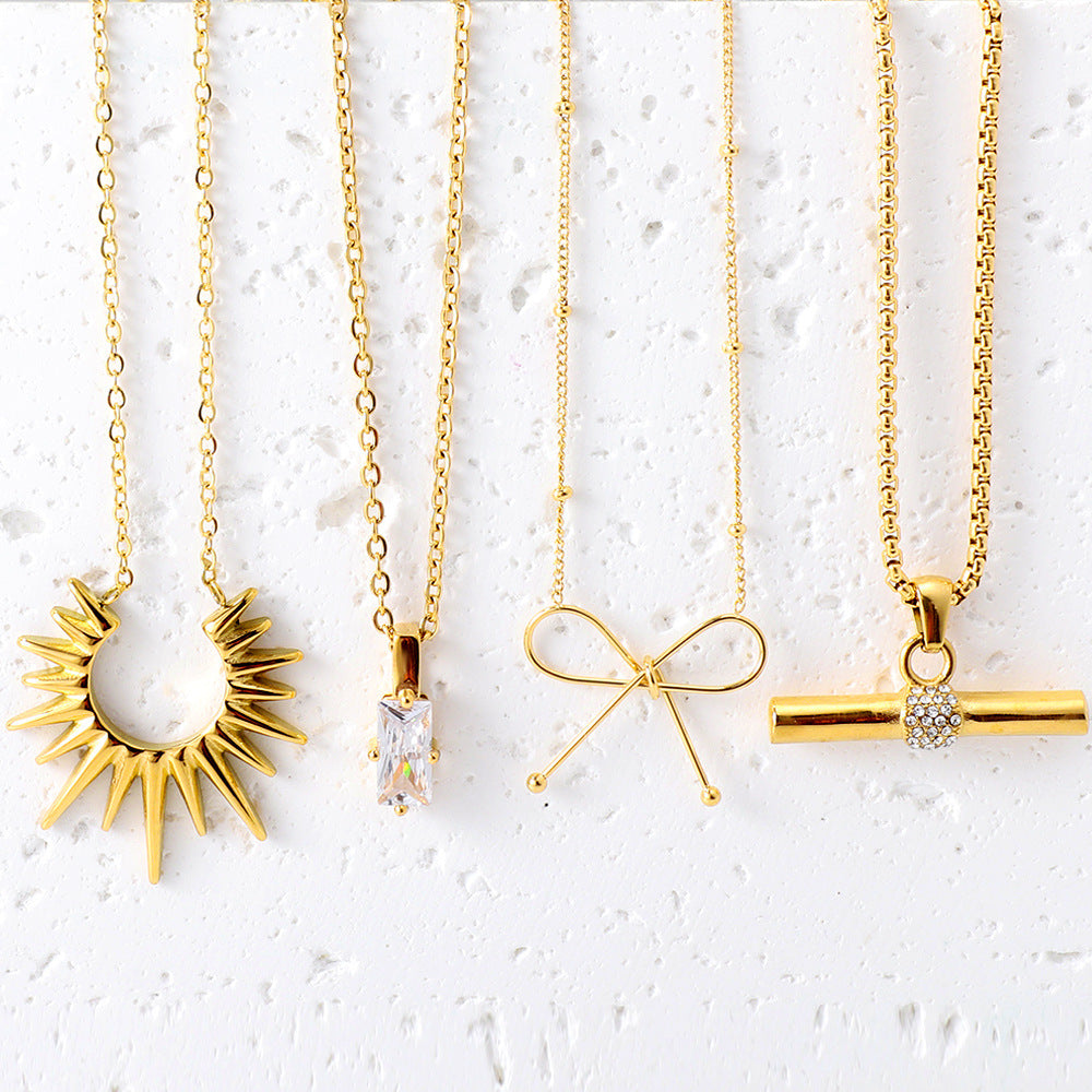 Damen Halskette mit funkelndem Anhänger aus Edelstahl und goldplattiertem Design Shop Nory