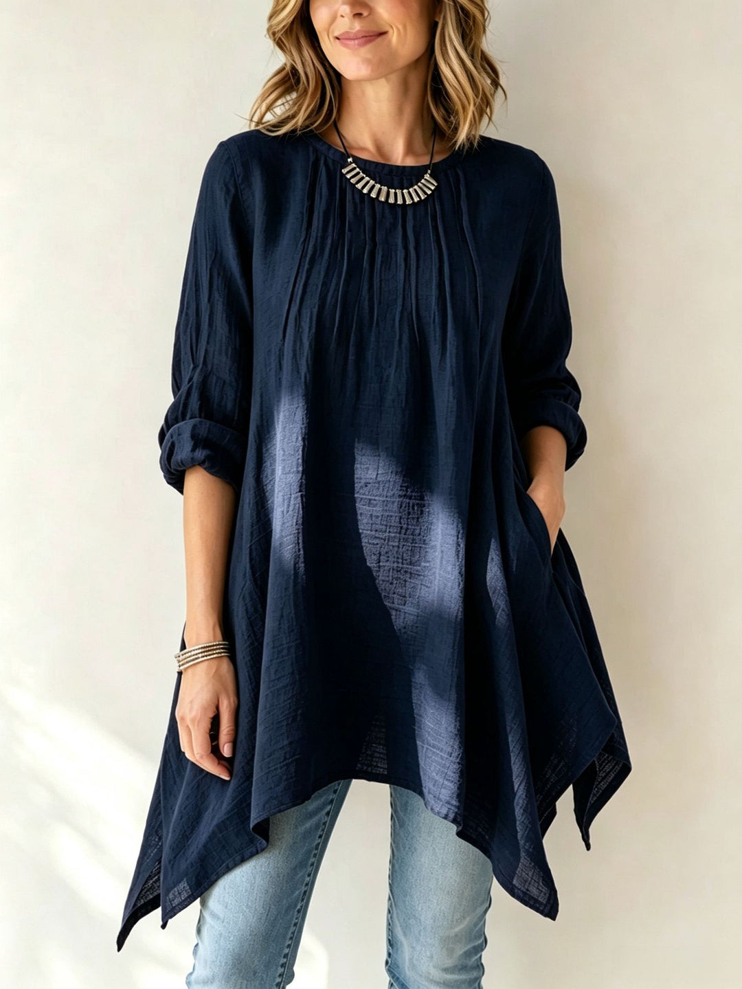Damen Lässige Tunika-Bluse mit asymmetrischem Saum, feiner Waffelstruktur und Kellerfalten Shop Nory