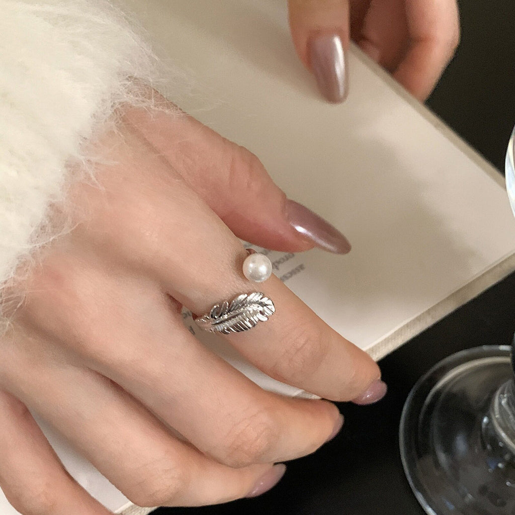 Damenring mit filigranem Federdesign und Perle Shop Nory