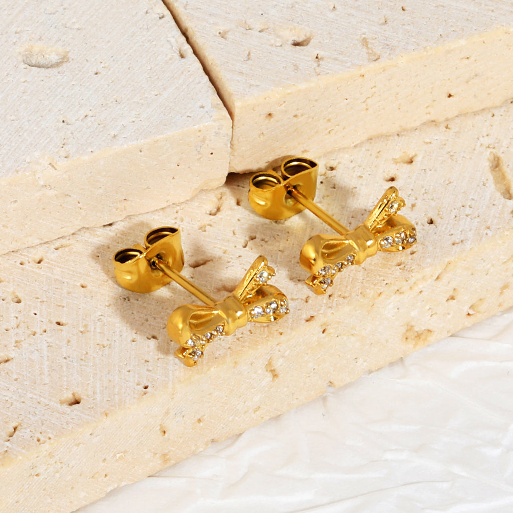 Damen Ohrstecker im eleganten Schleifen-Design mit funkelnden Zirkonia Shop Nory