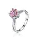 Damen Solitär ring mit strahlendem rosafarbenem Zirkonia und elegantem Besatz Shop Nory