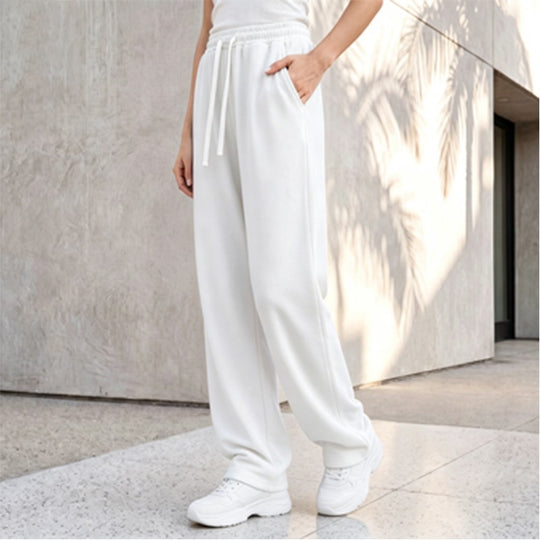 Damen nan weite Loungepalazzo-Hose mit hohem Komfortbund, Kordelzug, seitlichen Eingrifftaschen und dekorativer Seitennaht Shop Nory