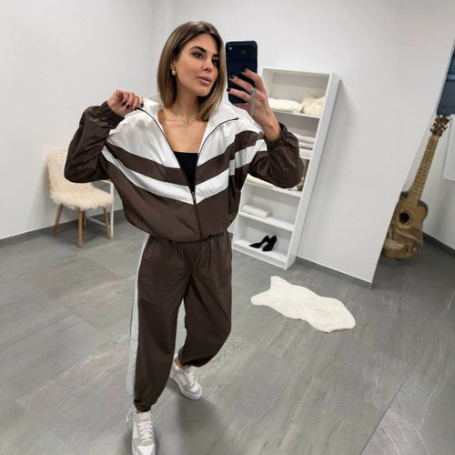 Damen retro Nylon-Trainingsanzug mit Kapuzen-Zipjacke und weiter hochgeschnittener Hose Shop Nory