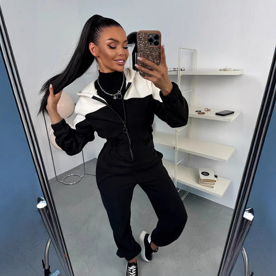 Damen gemütlicher Fleece-Overall mit Kapuze, durchgehendem Reißverschluss und elastischen Bündchen Shop Nory