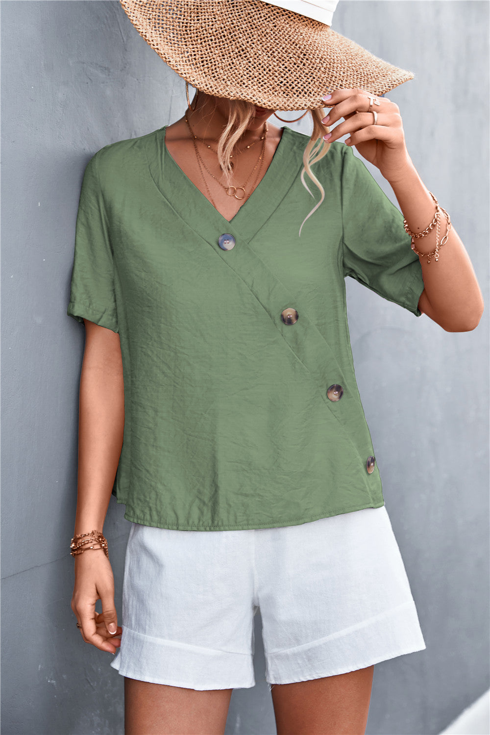 Damen lässige Bluse mit Wickeloptik und Knopfdetails